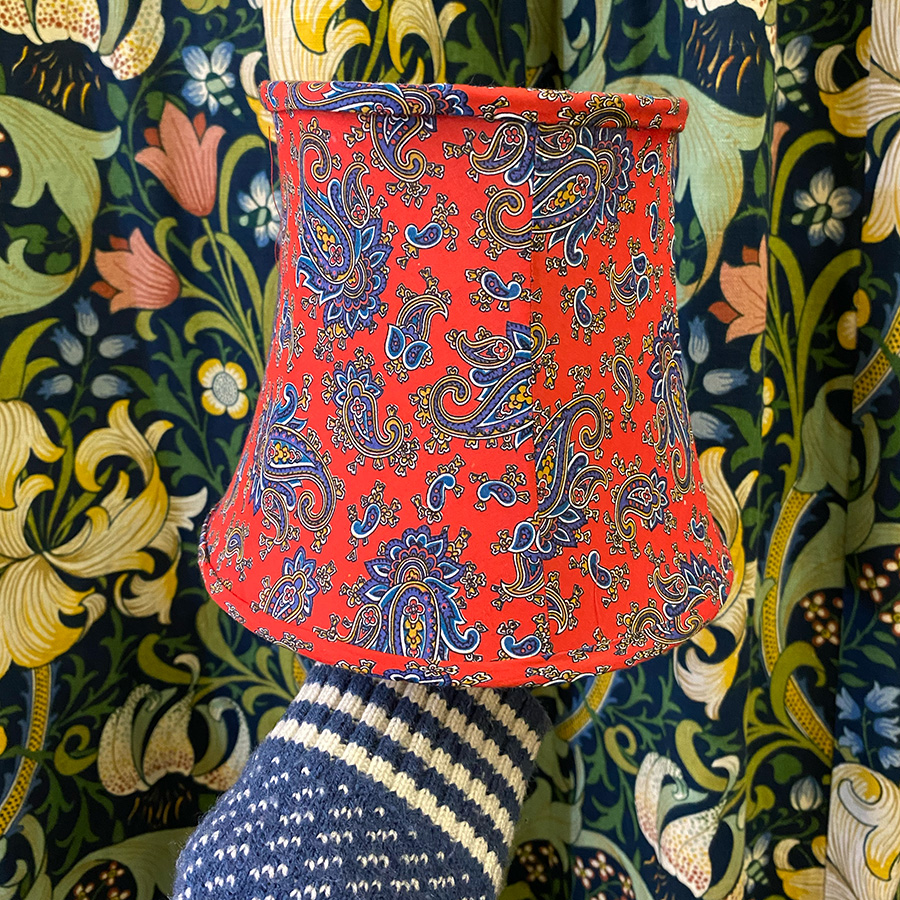 Small lampshade with hand stitched paisley fabric and balloon lining