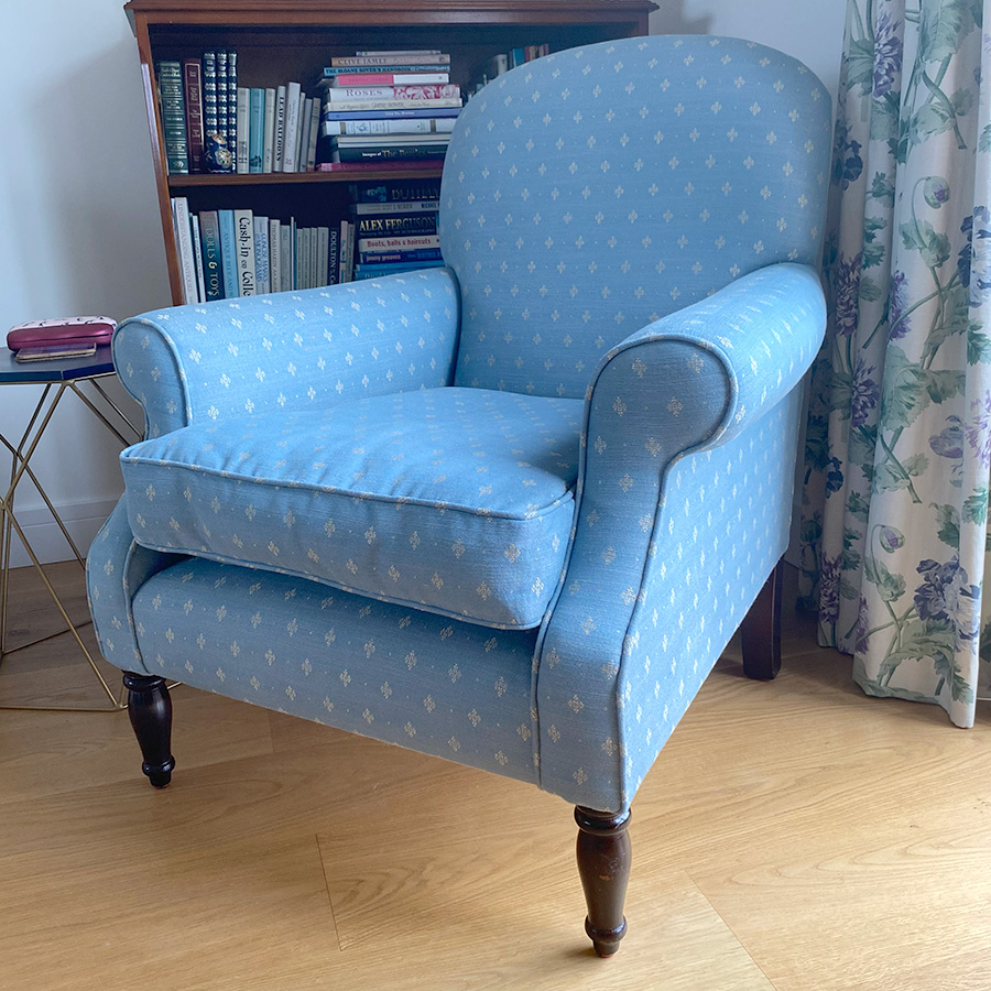 Laura Ashley armchair with feather cushion recovered in a Linwood fabric.